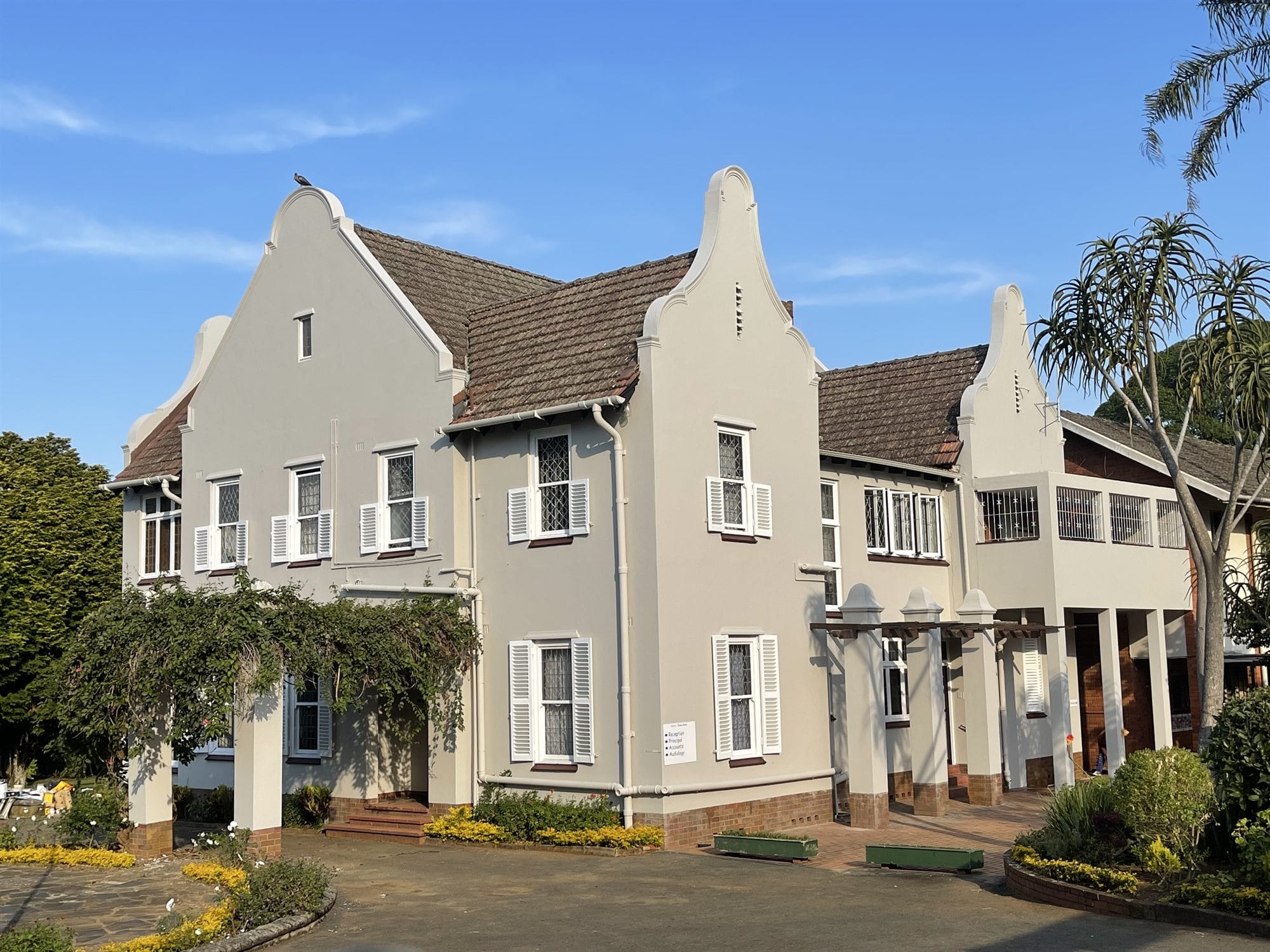 Heritage Cape Dutch building exterior fully restored with fresh paint
