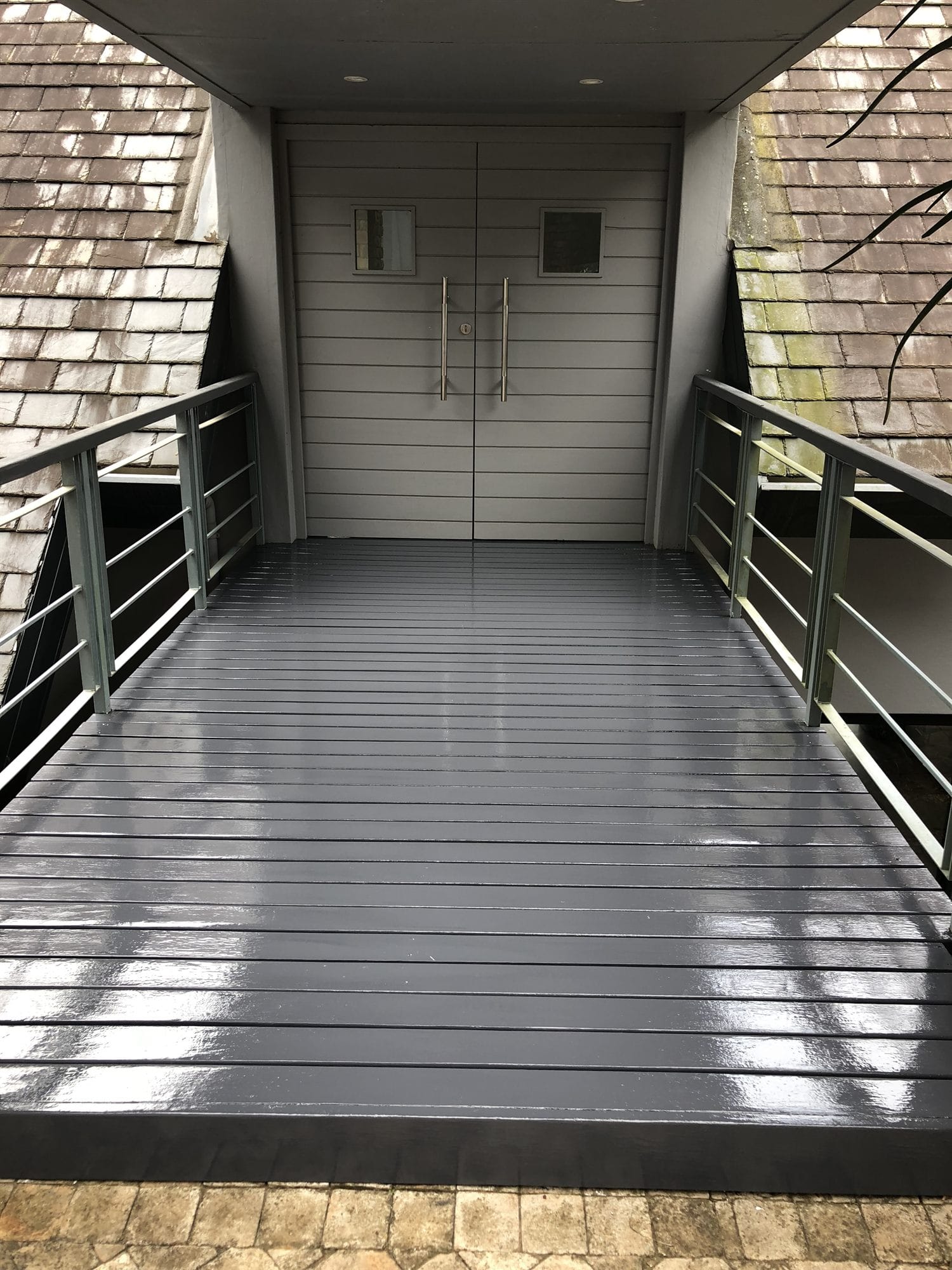 Restored and sealed timber walkway deck